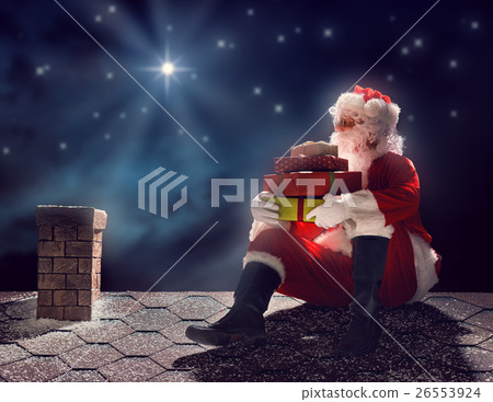 Santa Claus sitting on the roof 26553924