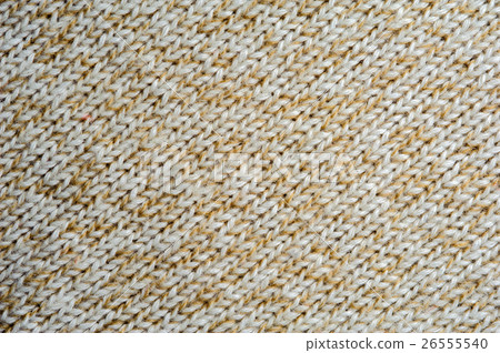 Beige knitted woolen fabric texture Beige knitted woolen fabric texture 26555540