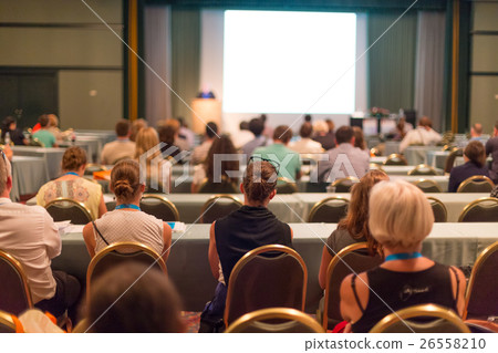 Audience in lecture hall participating at business Audience in lecture hall participating at business 26558210