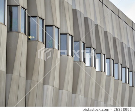 Facade of a modern building made of concrete with 26558995