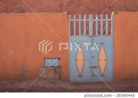 Orange fence and a blue gate, Morocco 26560448