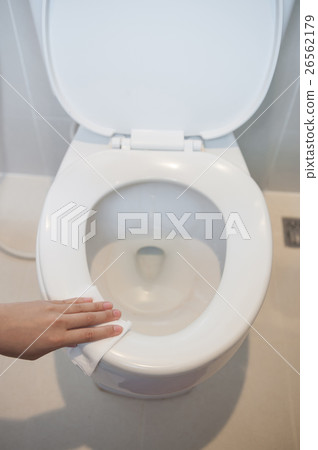 cleaning on toilet. 26562179