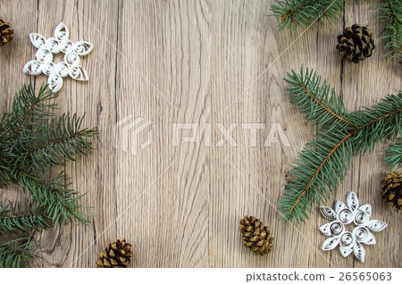 Christmas wood background with handmade snowflakes Christmas wood background with handmade snowflakes 26565063