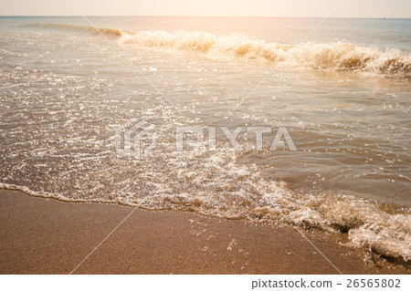 Wave on the shore. 26565802