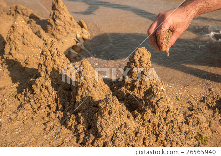 Sand towers on the beach. Sand towers on the beach. 26565940