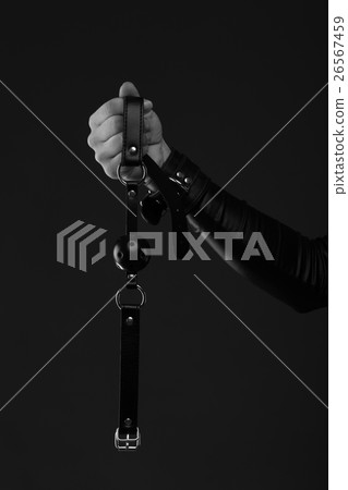 woman holds a gag 26567459