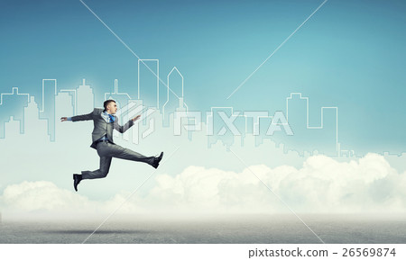Businessman jumping high 26569874