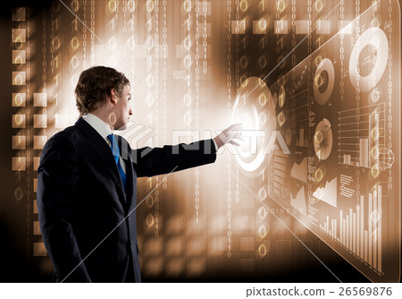 Businessman using modern technologies Businessman using modern technologies 26569876