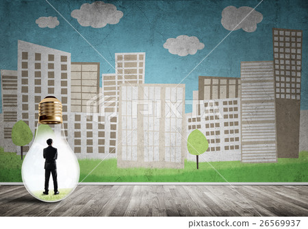 Businessman trapped in bulb Businessman trapped in bulb 26569937
