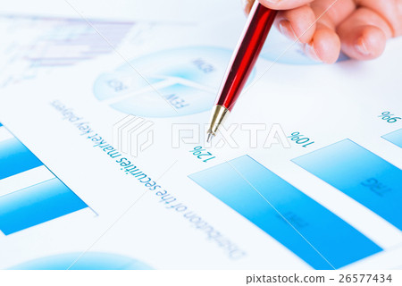 female hand pointing to the financial growth chart female hand pointing to the financial growth chart 26577434