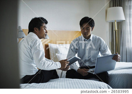 Hotel room meeting businessman Hotel room meeting businessman 26583995