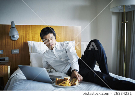 Hotel relaxing businessman breakfast Hotel relaxing businessman breakfast 26584221