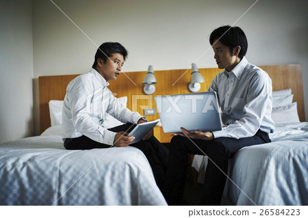 Hotel room meeting businessman Hotel room meeting businessman 26584223