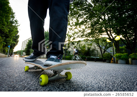 Men's feet on a skateboard Men's feet on a skateboard 26585652