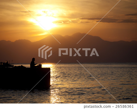 Dusk and angler Dusk and angler 26586361