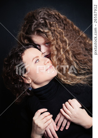 Mother and Daughter Hugging. Happy Loving Family 26587912