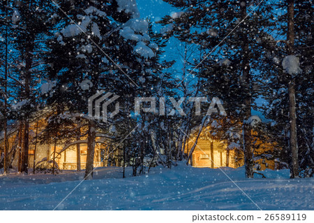 Wintersnowfall night, small wooden houses Wintersnowfall night, small wooden houses 26589119