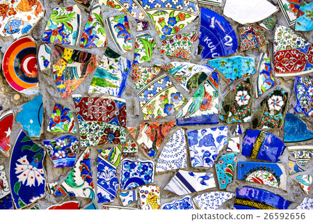 Wall with broken ceramic plates colored fragments Wall with broken ceramic plates colored fragments 26592656