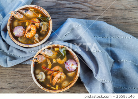 Two bowls of thai tom yum soup Two bowls of thai tom yum soup 26595146