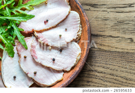 Baked meat with fresh rocket salad 26595633