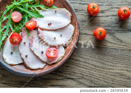 Baked meat with fresh rocket salad 26595634