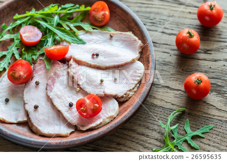 Baked meat with fresh rocket salad 26595635