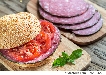 Sandwich with salami and tomatoes 26595655