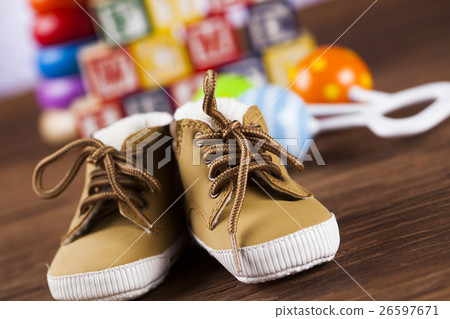 Stuffed baby toys on wooden background Stuffed baby toys on wooden background 26597671