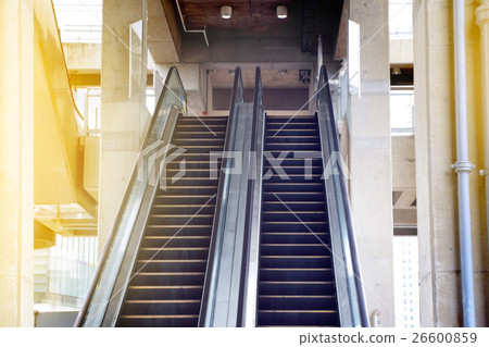 Empty escalator stairs in public building. 26600859