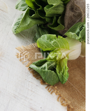 baby bok choy on a wooden table 26611203