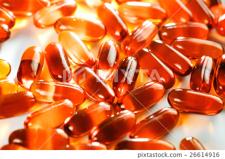 Gel capsules with Omega fish oil close-up 26614916