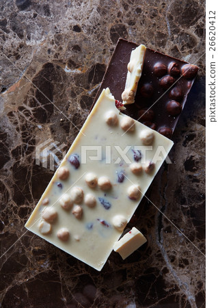 dark and white chocolate with nuts dark and white chocolate with nuts 26620412