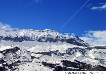 Snowy mountains and blue sky at nice winter day 26622138