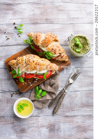 Wholegrain croissants with mozzarella and pesto Wholegrain croissants with mozzarella and pesto 26622317