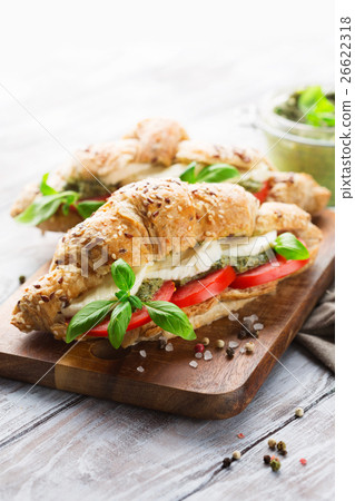 Wholegrain croissants with mozzarella and pesto 26622318