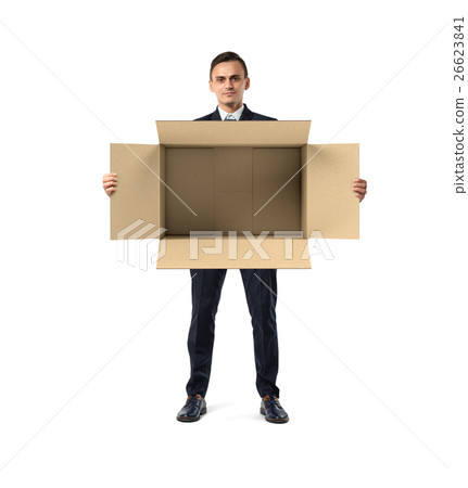 Businessman standing and holding big open empty Businessman standing and holding big open empty 26623841