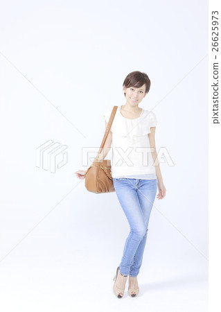 A woman with a shoulder bag A woman with a shoulder bag 26625973