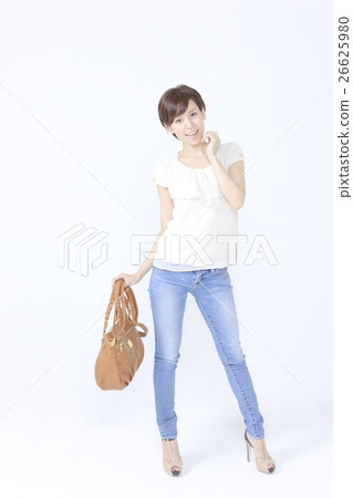 A woman with a shoulder bag A woman with a shoulder bag 26625980