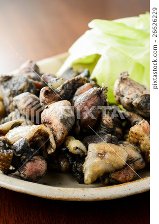Charcoal grilling of chicken 26626229