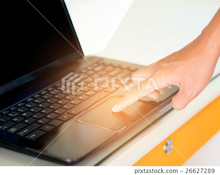 forefinger pressing Touchpad button . forefinger pressing Touchpad button . 26627289