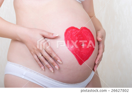 Belly of the expectant mother Belly of the expectant mother 26627802