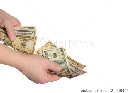 Dollars in a man's hand isolated on white Dollars in a man's hand isolated on white 26630445