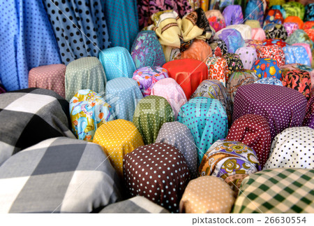 Fabric on rool for sale at the  textiles market 26630554