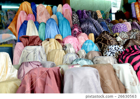 Fabric on rool for sale at the  textiles market 26630563