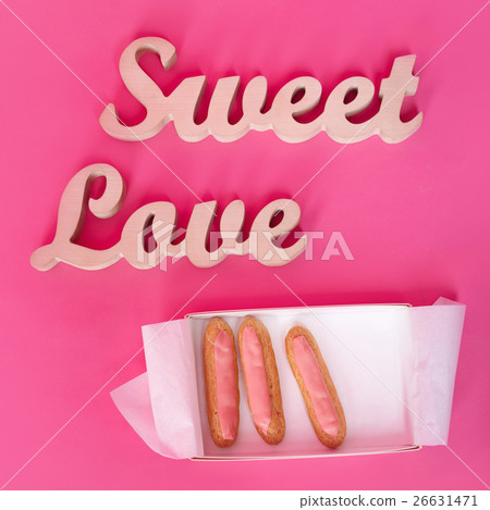 Words sweet love, wooden letters on pink paper 26631471