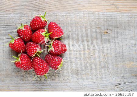 Raspberry on wooden table 26633197