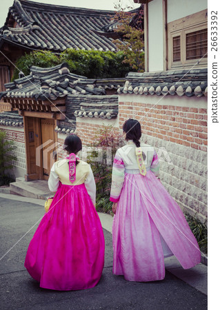 A couple women in Bukchon Hanok Village in Seoul 26633392