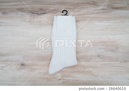 Socks on wooden background . Socks on wooden background . 26640010
