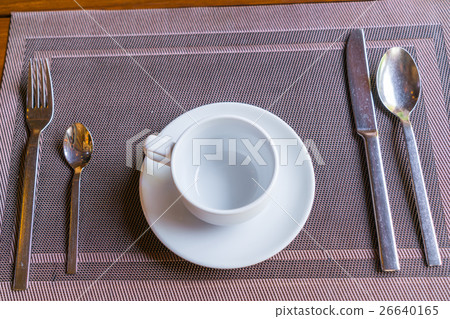 Empty cup of coffee with accessories on breakfast table . Empty cup of coffee with accessories on breakfast table . 26640165