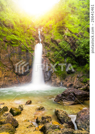 Beautiful Waterfall in jungle at sunset Beautiful Waterfall in jungle at sunset 26641461